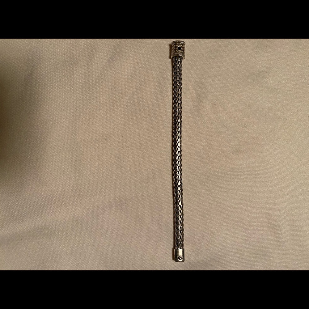 Woven sterling silver bracelet.
